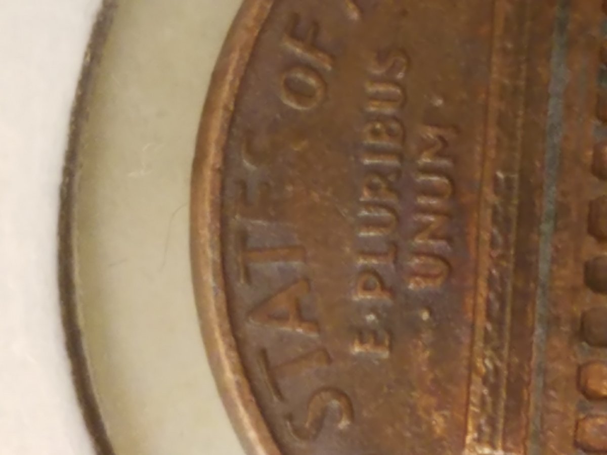 Is-The-Es-In-United-States-Faded-Because-Of-A-Minting-Error-Lmc