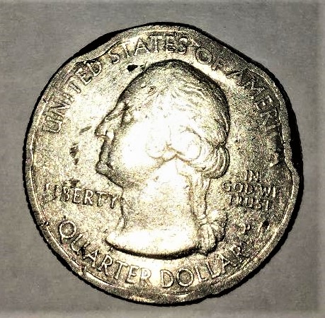 2015-Quarter.--Is-This-An-Example-Of-Circulation-Damage-Or-A-Mint-Error?