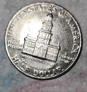 1976-Kennedy-Half-Dollar-Obverse-Error-Or-PMD?