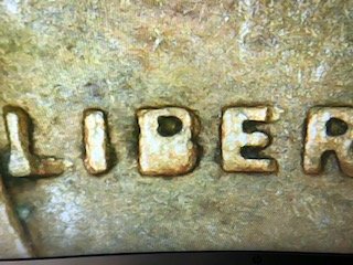 1957-D-One-Cent-Damage-Or-Error?
