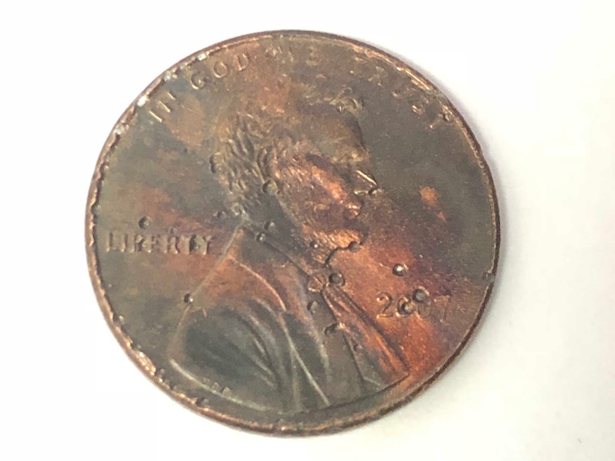 2007-Penny-Multiple-Holes-On-Front-And-Back-Error-Or-Damage?