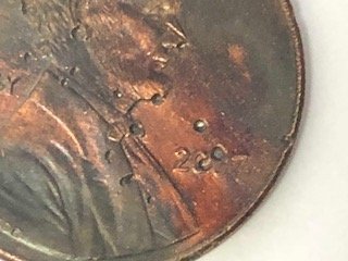 2007-Penny-Multiple-Holes-On-Front-And-Back-Error-Or-Damage?