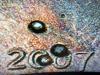 2007-Penny-Multiple-Holes-On-Front-And-Back-Error-Or-Damage?