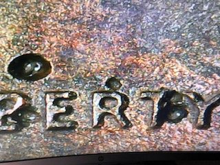 2007-Penny-Multiple-Holes-On-Front-And-Back-Error-Or-Damage?