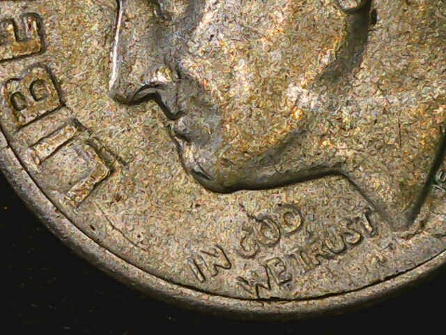 1955-S-Dime.-Trying-To-Figure-Out-Whats-Going-On-With-The-Chin-And-Mouth.