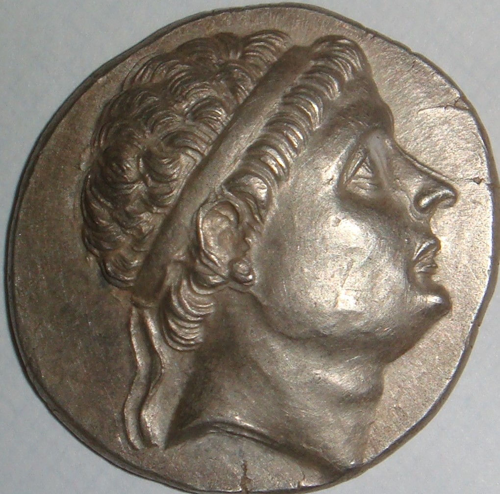 PVC-Damage-To-A-Silver-Antiochus-Tetradrachm-?