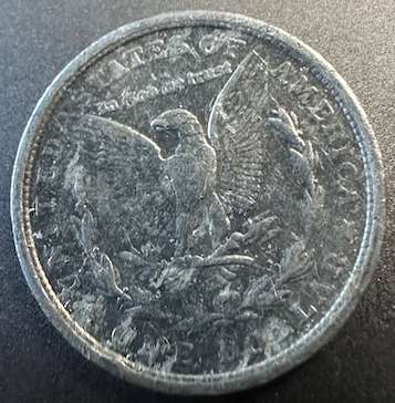 What-Looks-Like-A-Dime-But-States-One-Dollar-And-Reverse-Americana