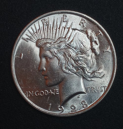 1923-Peace-Dollar.--Guesses?