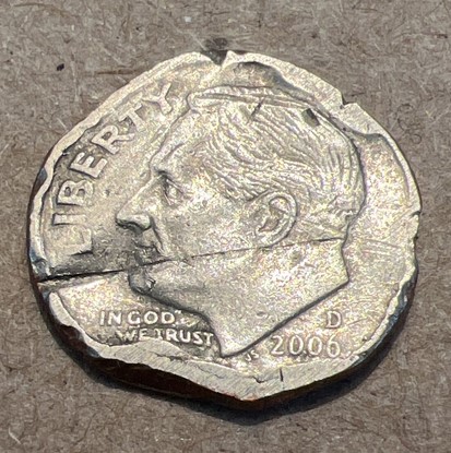 Error?-Post-Mint-Damage?-Is-It-Unique?-1999-P-Dime-Oddly-Printed