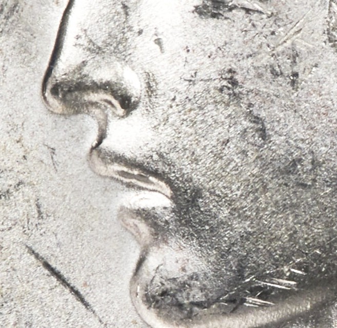 Stiff-Upper-Lip?-What-Is-That-Thing-On-This-1928-S-Peace-Dollar?