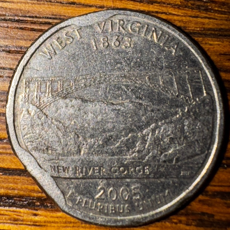 2005-P-Quarter-Clipped-Planchet-Or-PMD?