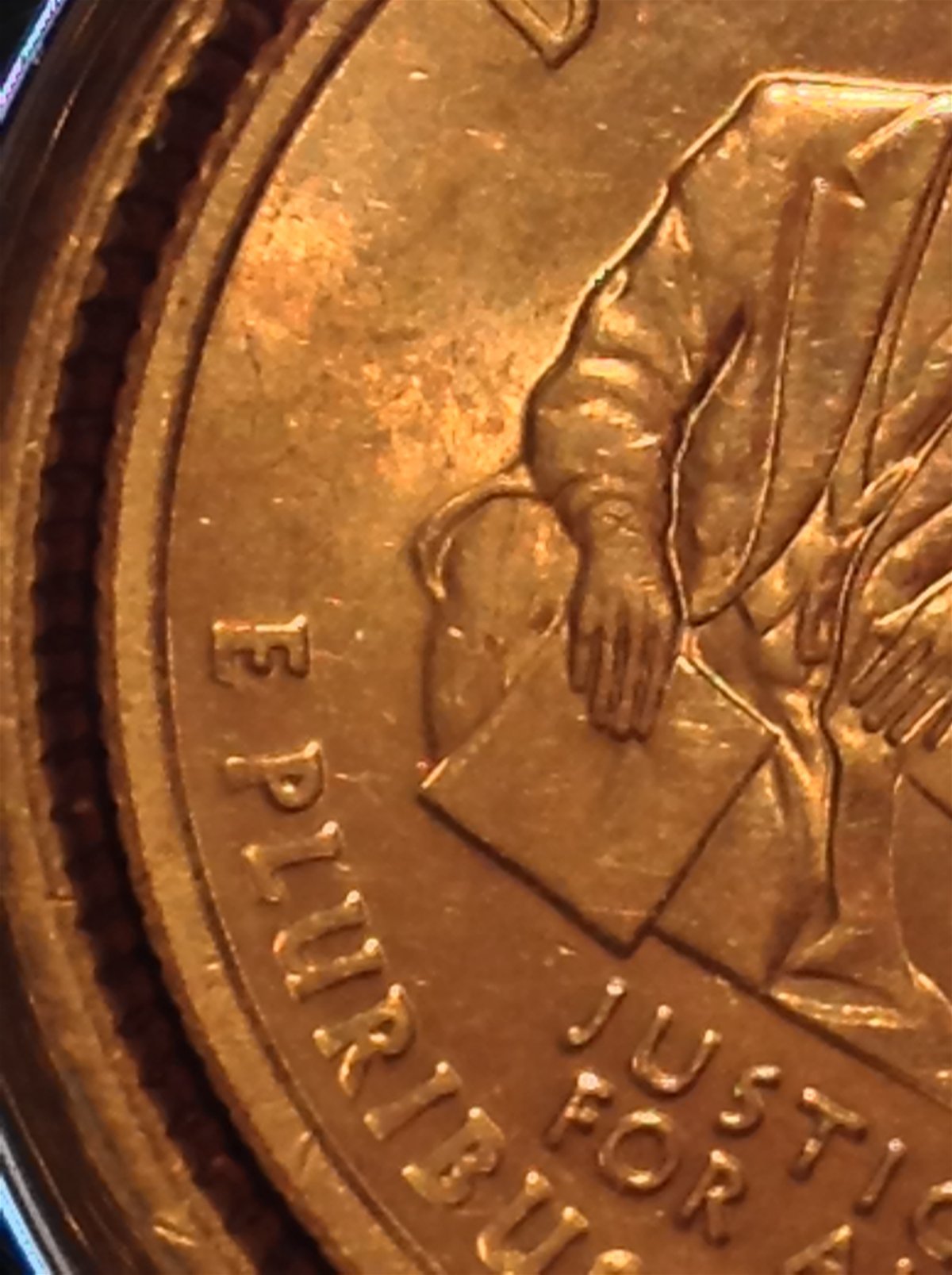Error-X-On-Dukes-Wrist-2009-US-Quarter