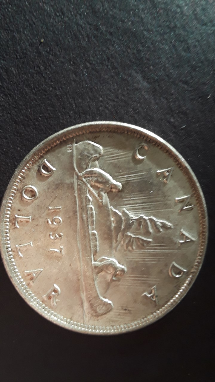 1937-Mint-State-Canadian-Dollar---Grade?