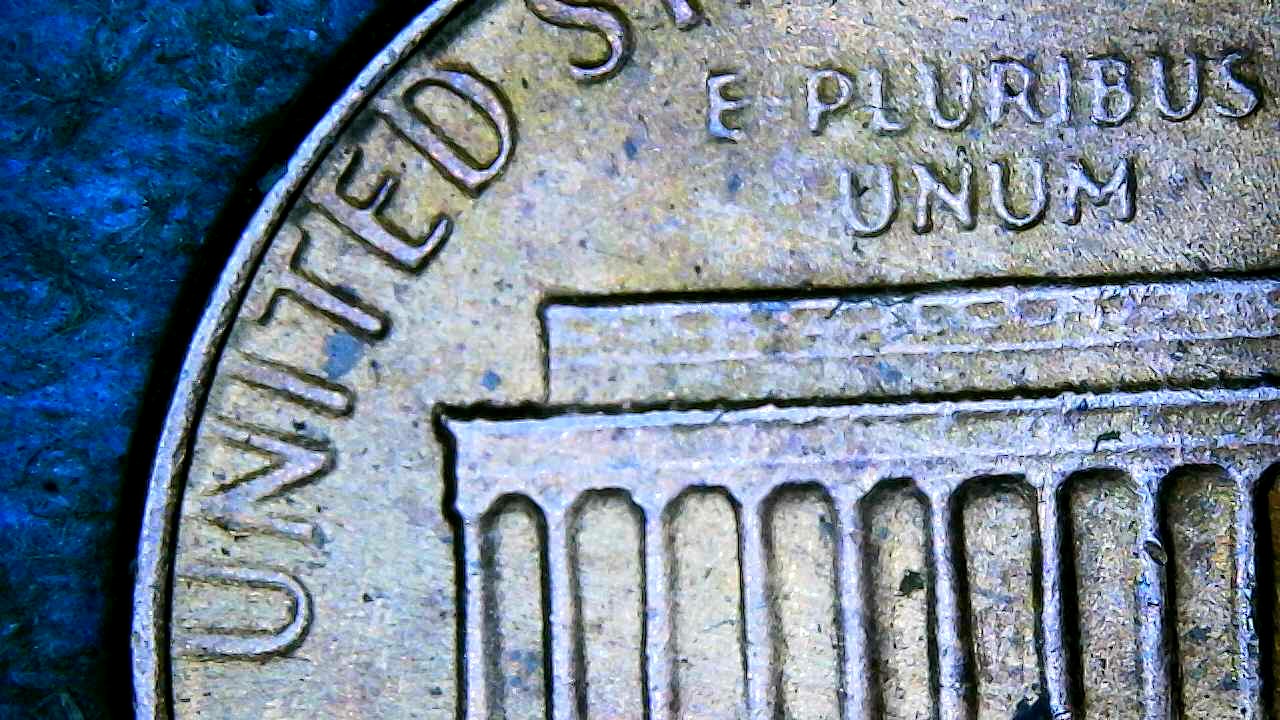 1982-D-Large-Date-Penny-What-Are-The-Lines-On-Both-Sides-Of-The-Cent-And-Why-Are-The-Letters-Stretch