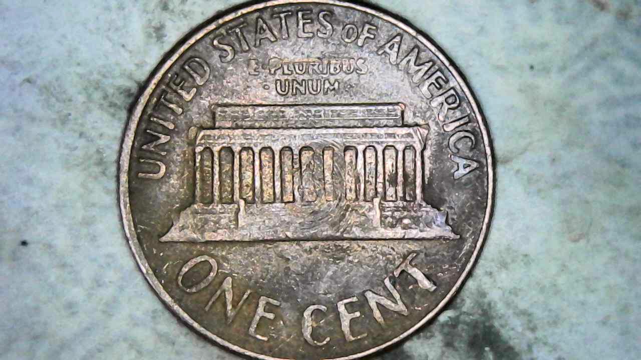 1964-D-Cent-Is-The-Damage-To-The-Reverse-Caused-By-A-Penny-Machine