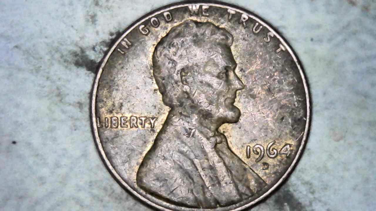 1964-D-Cent-Is-The-Damage-To-The-Reverse-Caused-By-A-Penny-Machine