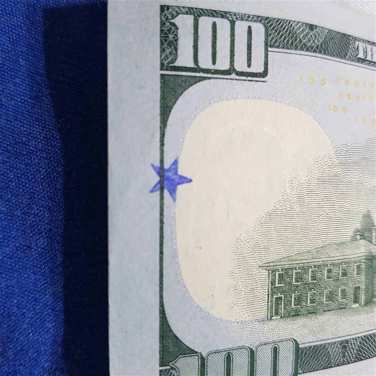 $100-Bill-With-Small-Blue-Star