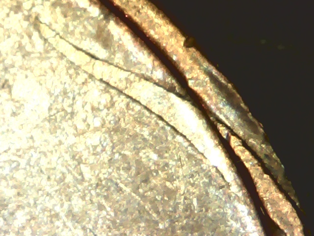 1970-D-Struck-Thru-Rim-Burr