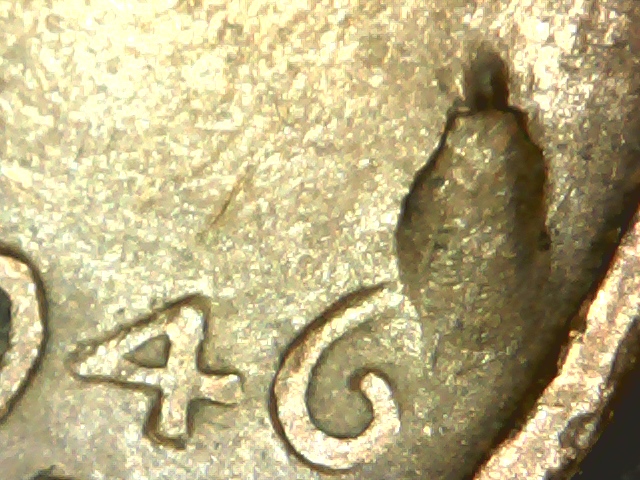 1946-D--Cent-Struck-Thru-Debris-Or-Defective-Planchet