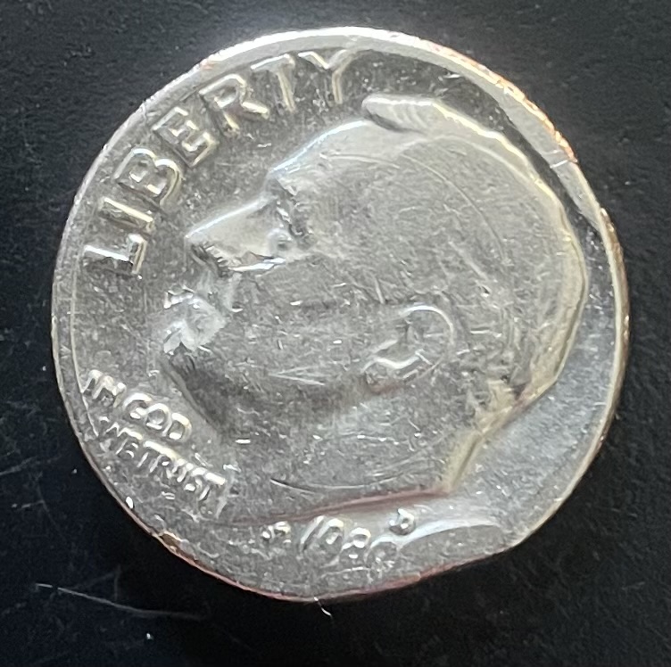 1980-Broad-Strike-Clipped-Planchet-Dime