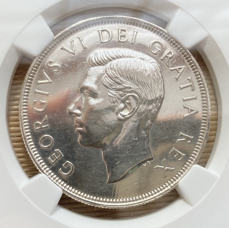 Can-Anyone-Guess-The-Grade-Of-This-1949-Dollar?