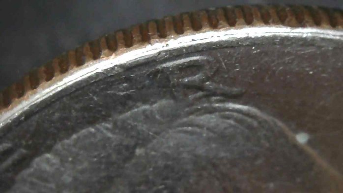 1984-P-Kennedy-Half-Dollar-With-A-Tiny-Rim-Cud-Or-Damage