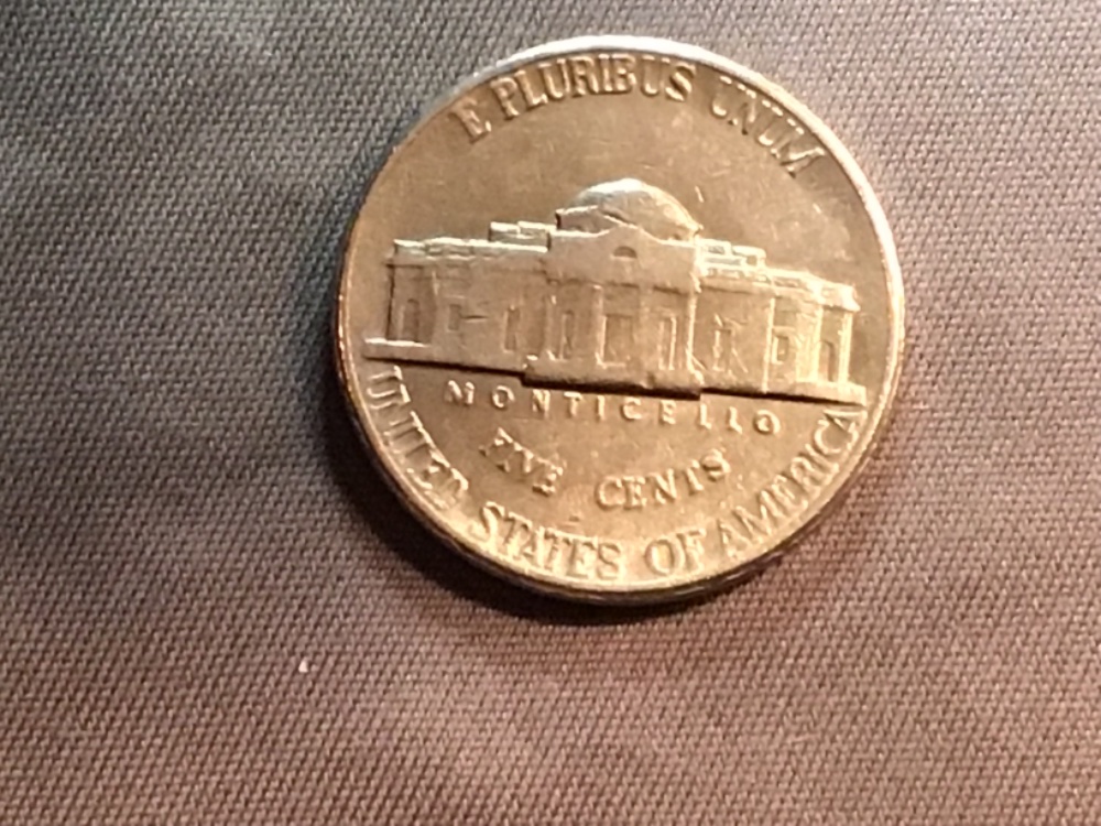 1987-P-Nickel--All-Lettering-Looks-Smashed-Against-Rim.-USA-Wide-Spread-Us