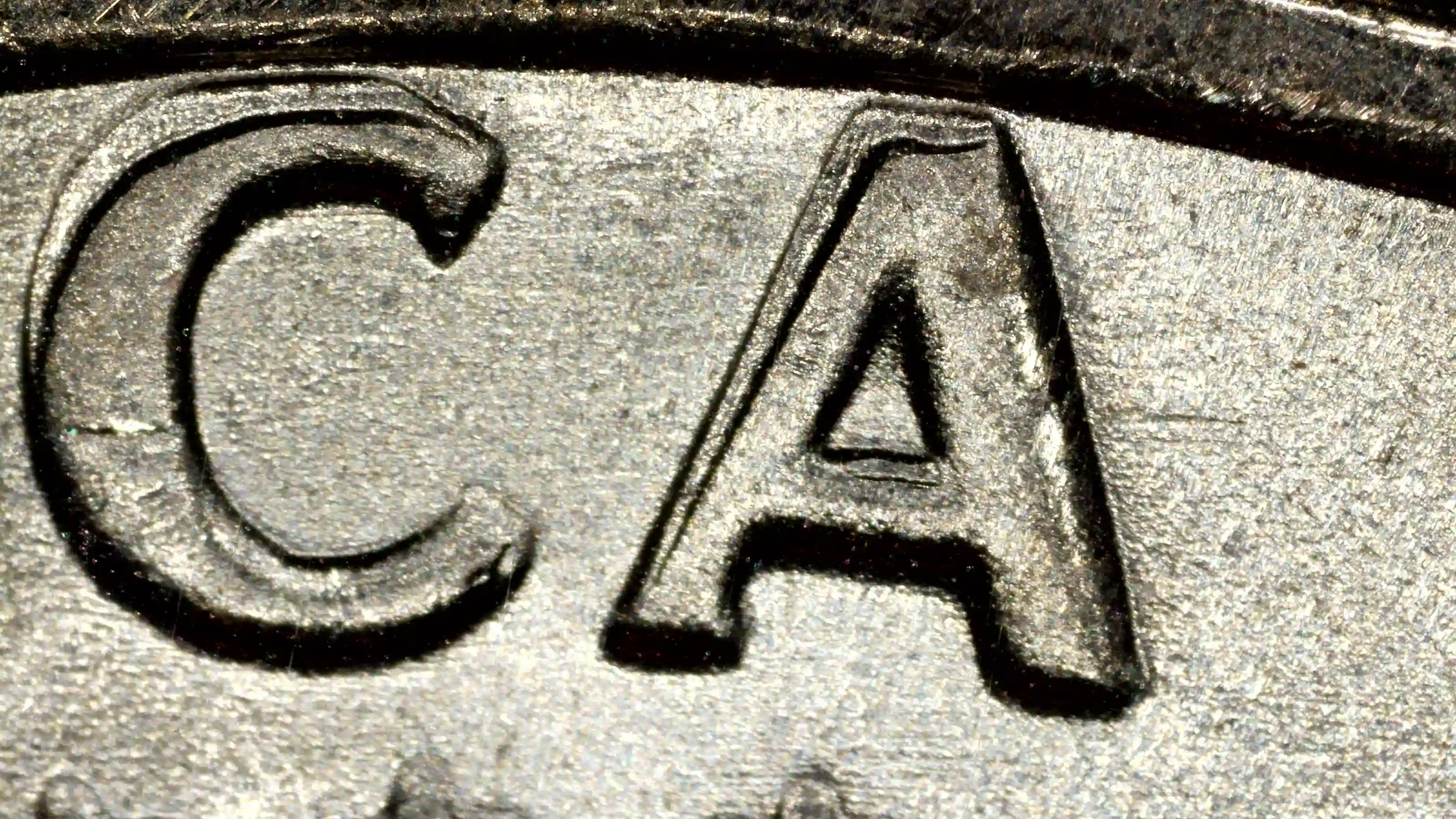 1977-D-Kennedy-Half-Dollar-Reverse-Lettering