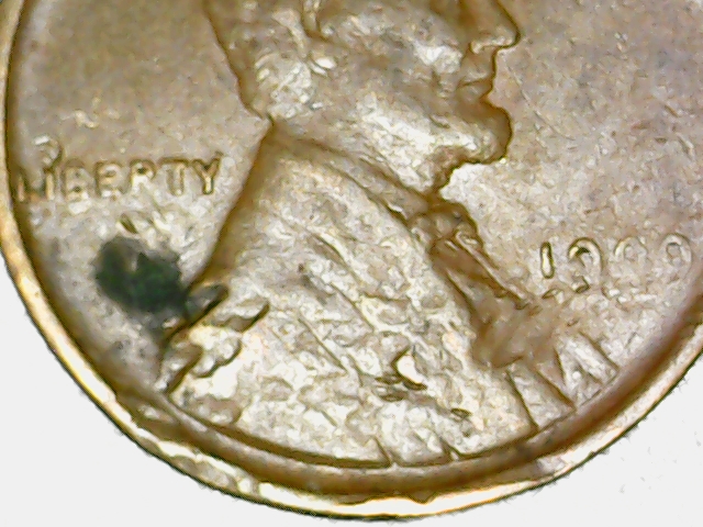 1909-Lincoln-Penny-With-Twisted-Rim,-Gas-Bubbles,-Multiple-Wheat-Stems