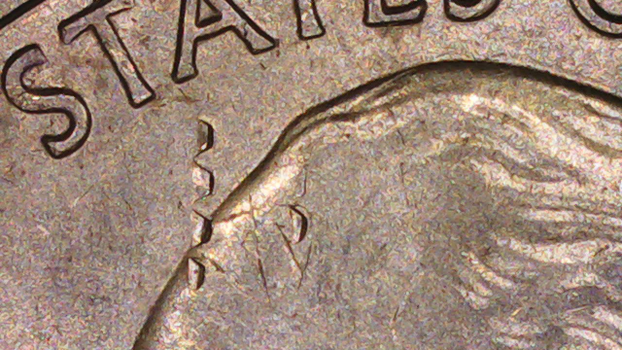 2020-P-Conn-State-Qu.-Looks-Like-Part-Of-The-Eagle-Wings-Top-Of-Head.-Any-Ideas.-Thanks