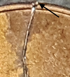 2021-D-Lincoln-Cent-With-Wire-Stuck-In-It