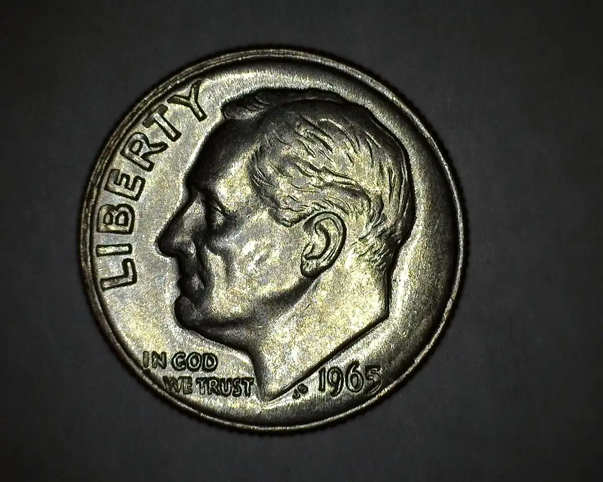 1965-Dime-Struck-Through-Debris