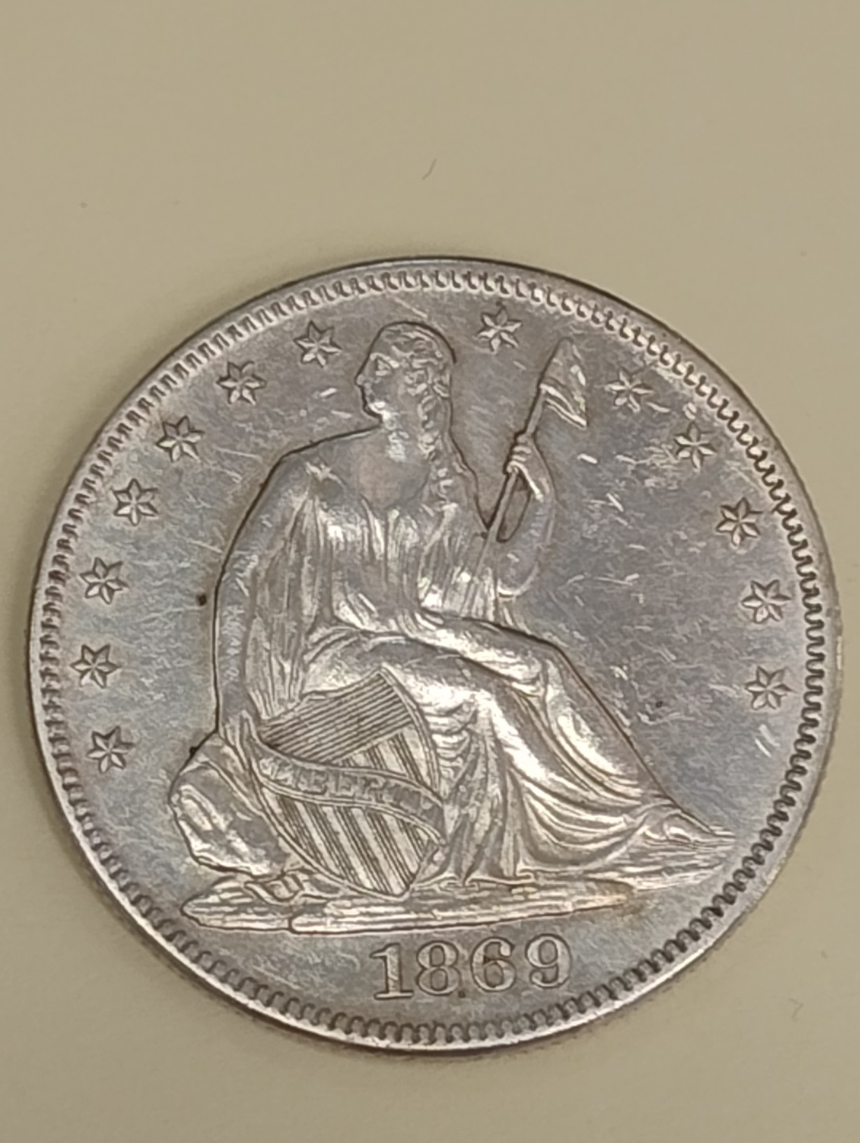 1869-P-Seated-Half-Dollar-At-'Legitimate'-Coin-Shop