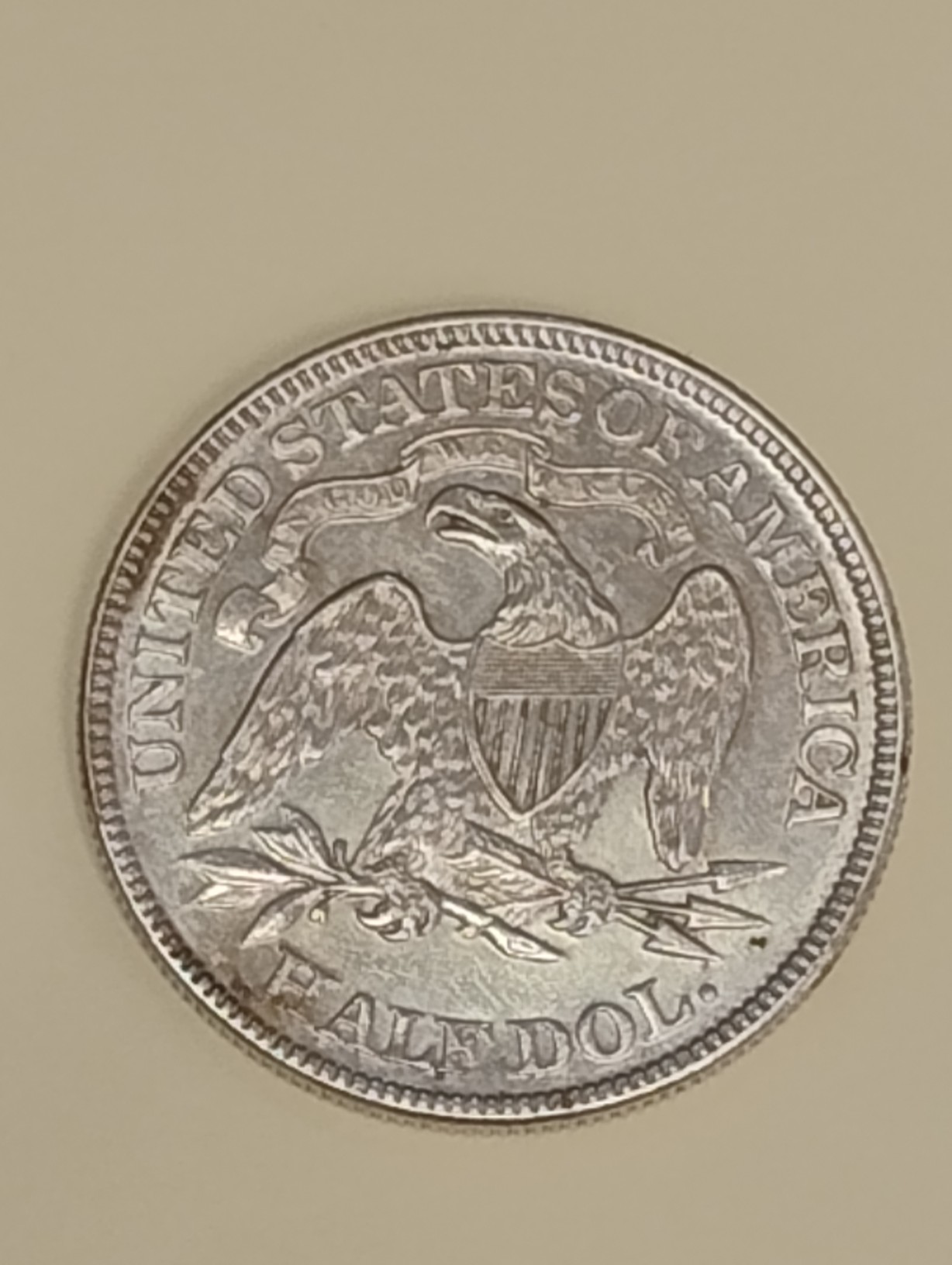 1869-P-Seated-Half-Dollar-At-'Legitimate'-Coin-Shop