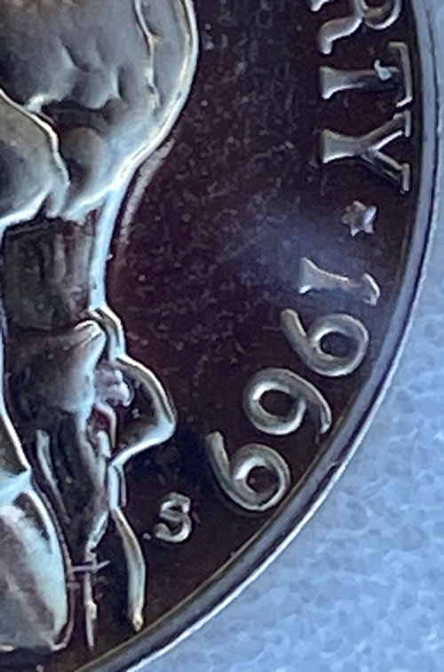 1969-S-Proof-Nickel---Heavy-Thickening-At-The-Base-Of-The-Type-Variety,-Damage-Or-An-Error?