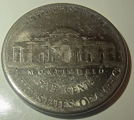 Jefferson-Nickel-Planchet-Error-Or-Dryer-Coin?