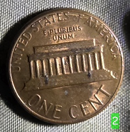 1984-Penny-Marking-Behind-Letters-On-Reverse-