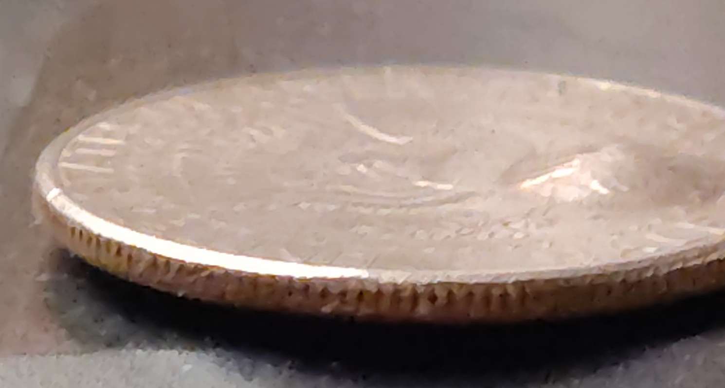 1997-D-Mint-Mark-Kennedy-Half-Dollar-With-Two-Bubbles-On-Each-Side.