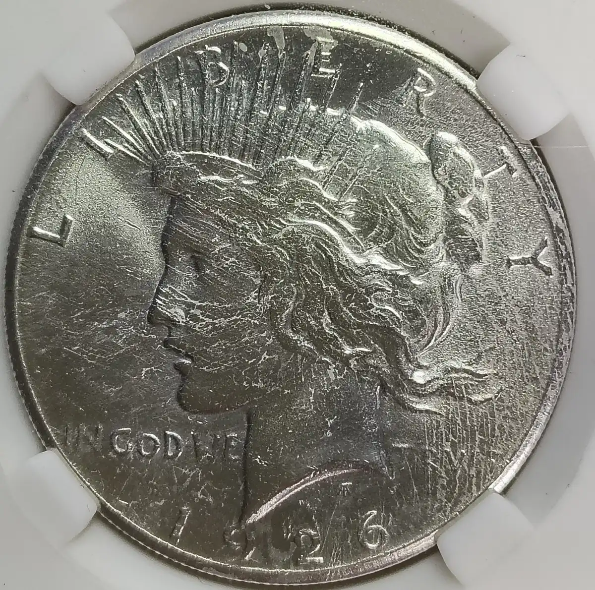 1926-Peace-Dollar-In-Pga-Holder-Looks-Weird