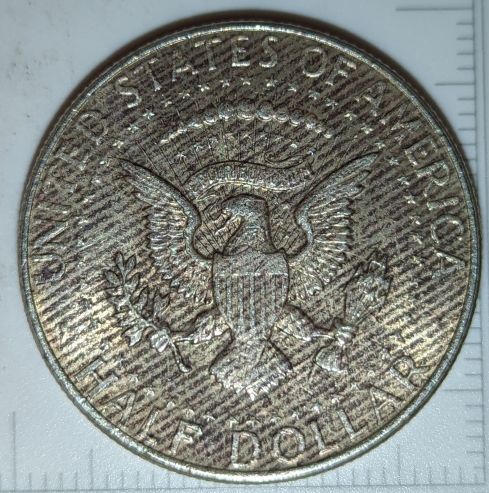 1964-Half-Dollar-With-Many-Parallel-Stripes
