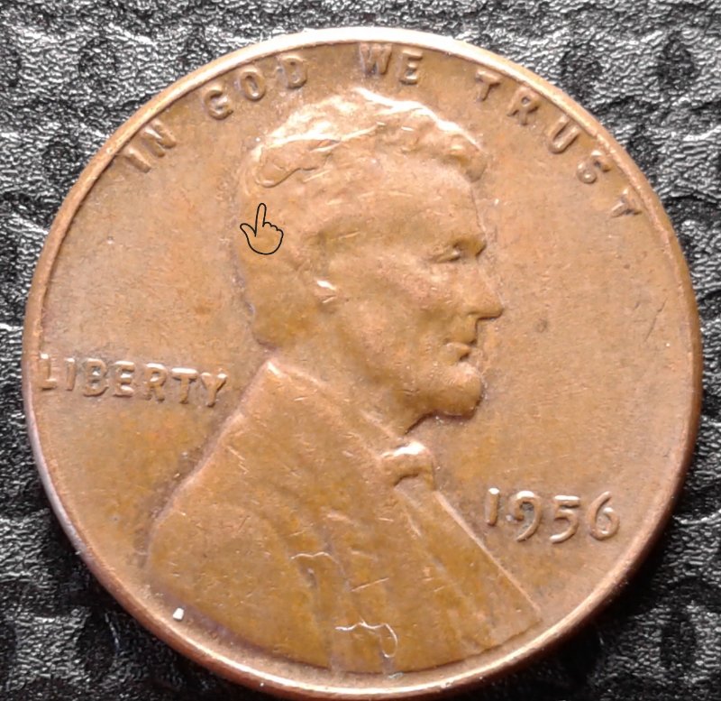 1956-P-LMC;-Obverse-With-Extra-Design-Or-Metal-In-Hair?