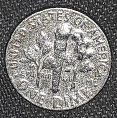 1965-Dime-Large-Bump-Around-Nose?