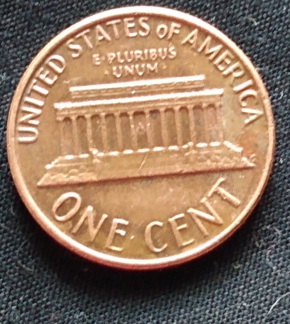 1976-D-Penny-Error-In-Background