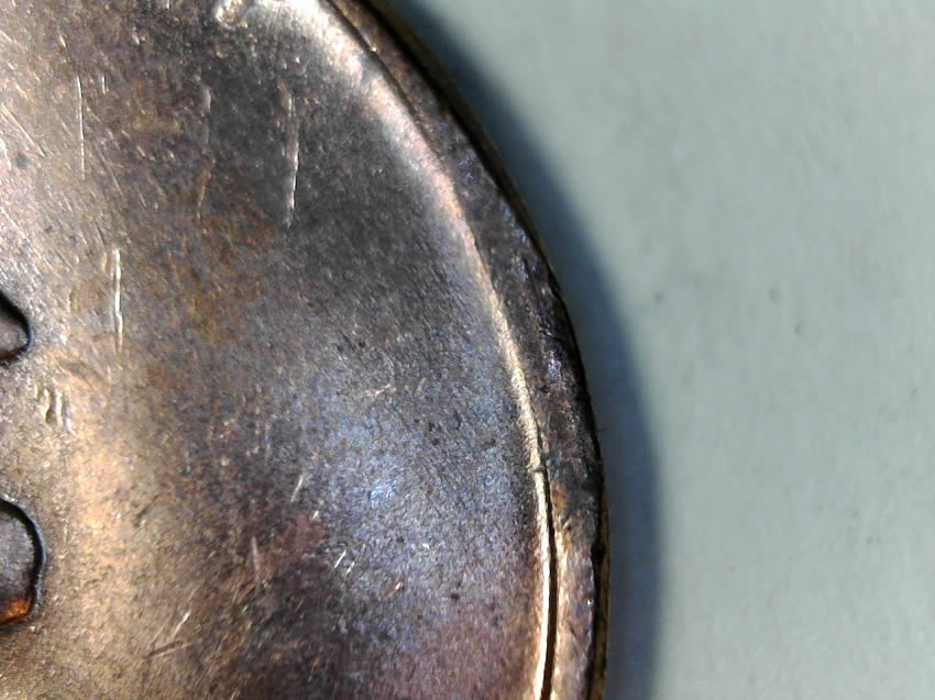 1957-D-Cent-Clipped-Planchet-With-Blakesly-Effect