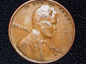 1948-D-Wheat-Penny--Strike-Through-Or-Lamination?