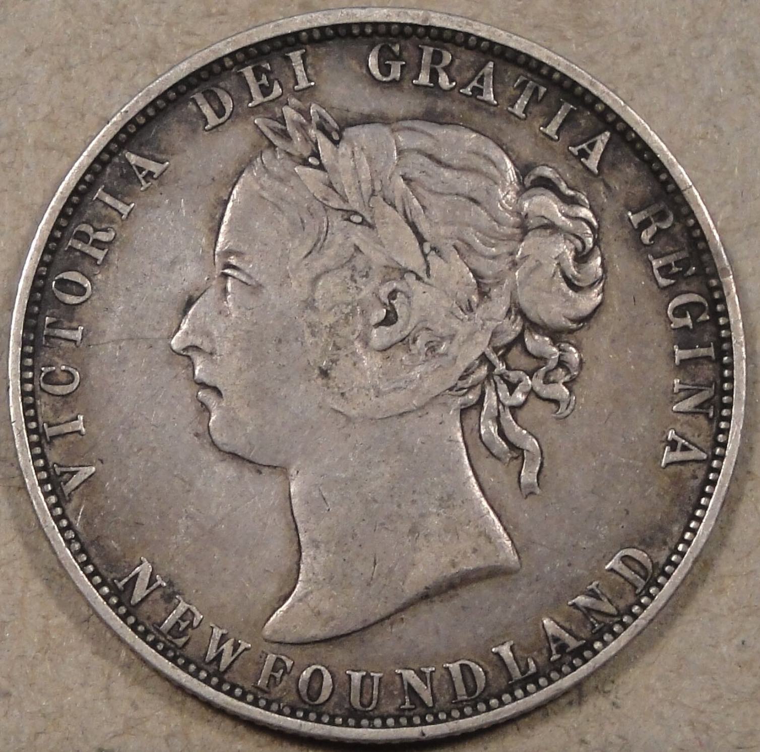 Newfoundland-50c---Obverse-1-Or-Obverse-2?