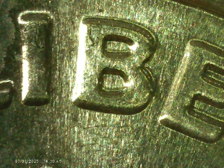 2019-D-Dime-What-Is-Sticking-Out-From-The-B-In-Liberty
