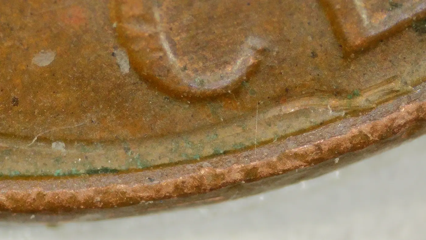 1986-D-LMC-Penny-/-Struck-Through-/-Reverse