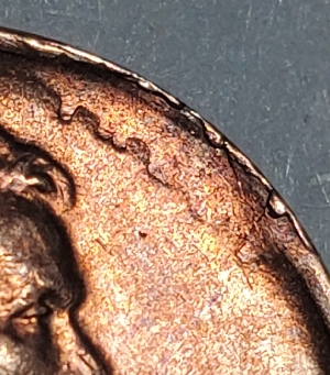 1929-Wheat-Penny-Error-Or-Post-Mint-Damage