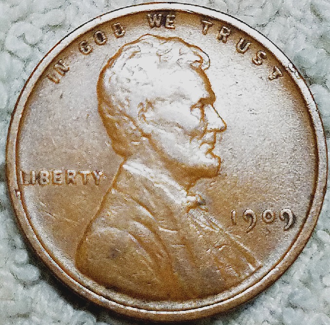 1909-Lincoln-Cent-With-A-Raised-Metal-Bridge-Connecting-Wheat-To-Rim